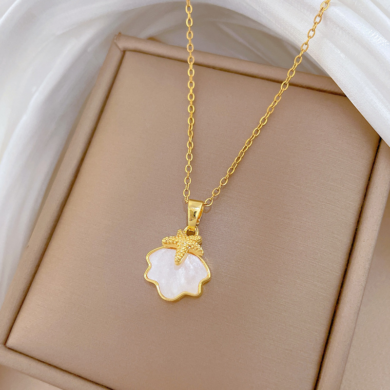 Colar de concha estrela do mar em aço titânio para mulher_voghion.com