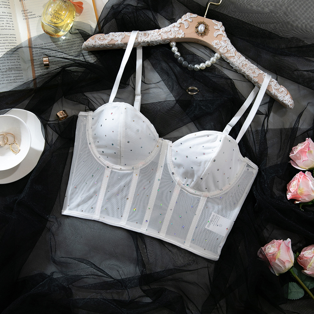 Cross-Border moda sexy discoteca estilo lentejuelas Fishbone acero anillo push up perspectiva ombligo expuesto caliente chica chaleco Delgado