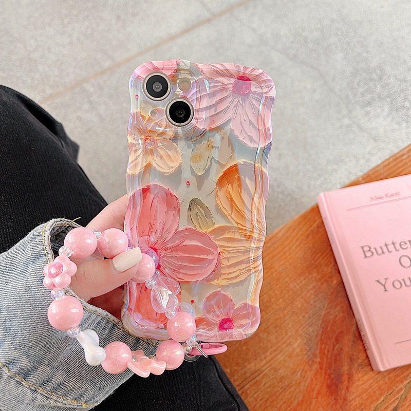 Suitable for high-end blue light oil painting flower iPhone 13 promax phone case Apple 14 women's 12 bracelet 11_voghion.com