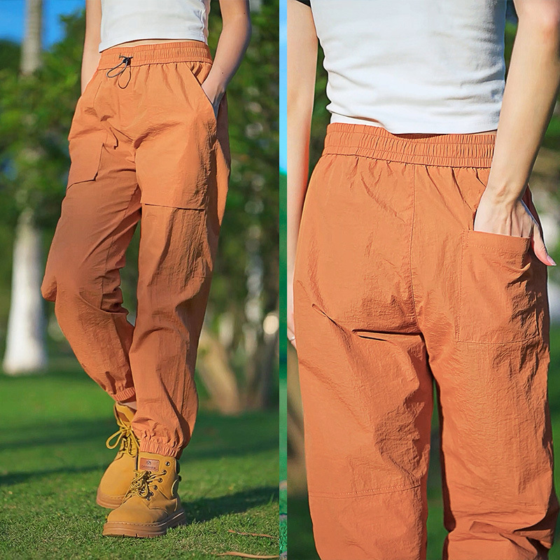 Fábrica directa de pantalones secos rápidos para hombres y mujeres de verano nuevos pantalones ligeros y transpirables parejas sueltos de pies deportivos casuales de nueve puntos