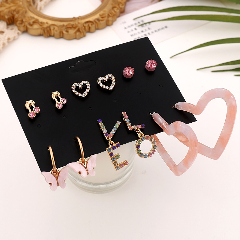 Fashion Letter Heart Shape Butterfly Alloy Plating Inlay Rhinestones Earrings Ear Studs 1 Set display picture 1