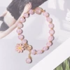 Bulk light pink beaded daisy bracelet