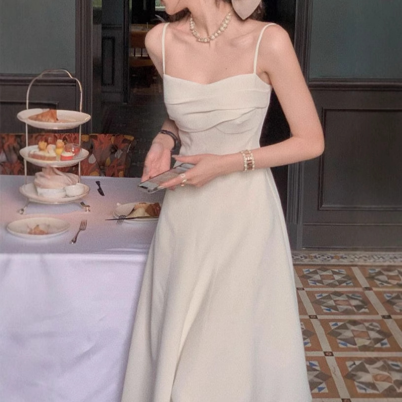 White dress 2023 spring and autumn two-piece short suit jacket waist-tight sleeveless niche design skirt