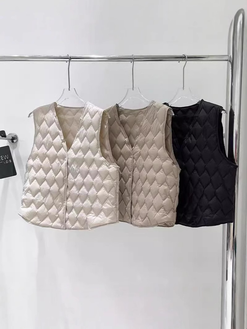 Otoño y invierno estilo chaleco de pluma de diamante caliente de mujer ligero revestimiento interior con chaleco de cuello en V delgado abrazadera de hombro