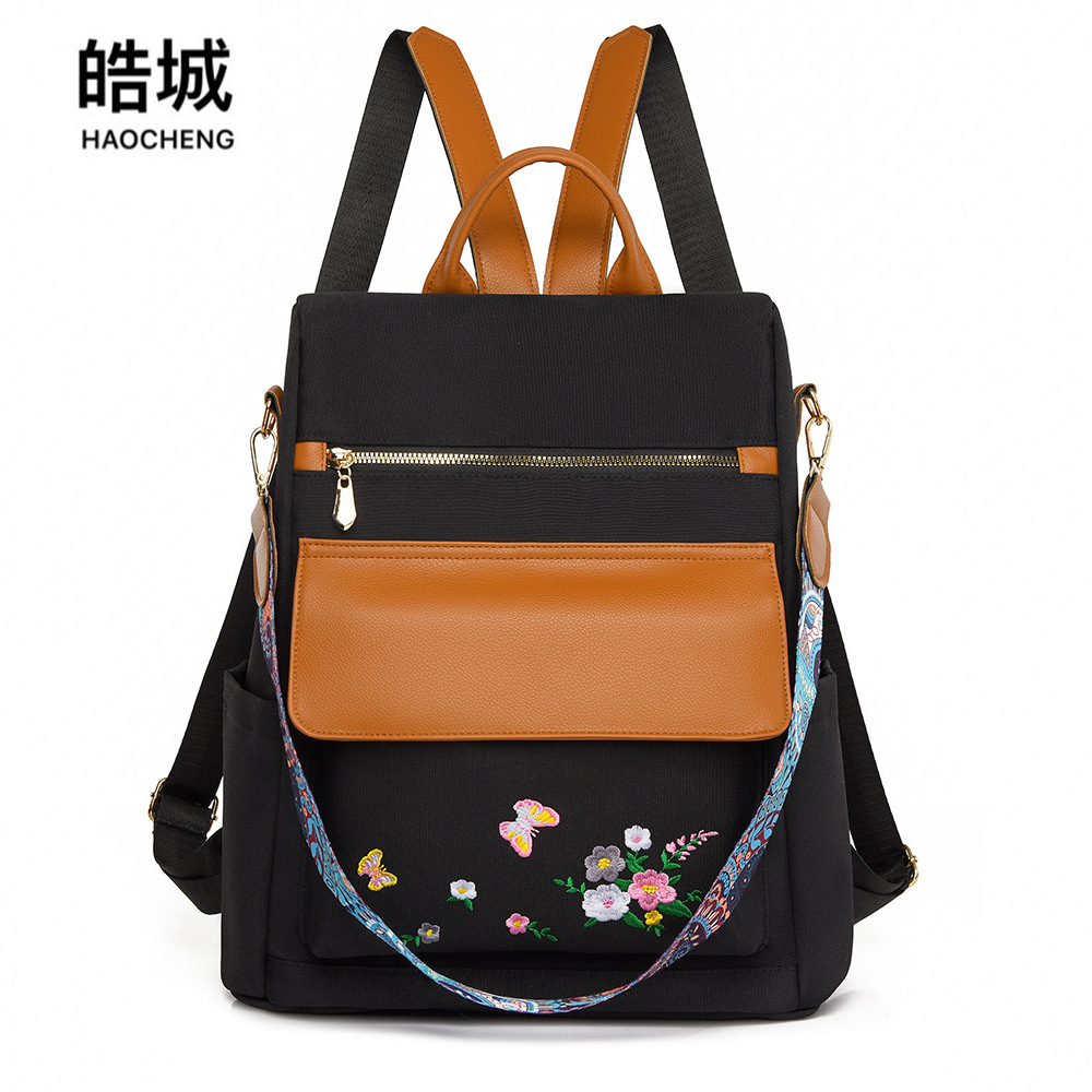 Mochila antirrobo para mujer bordada de nueva moda Mochila de viaje simple y ligera Mochila de doble uso para desplazamientos urbanos