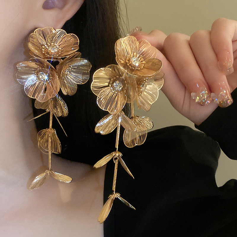 New Chinese style metal hollow flower large earrings female 2024 New Year Long Tassel ear clip without pierced bridal earrings