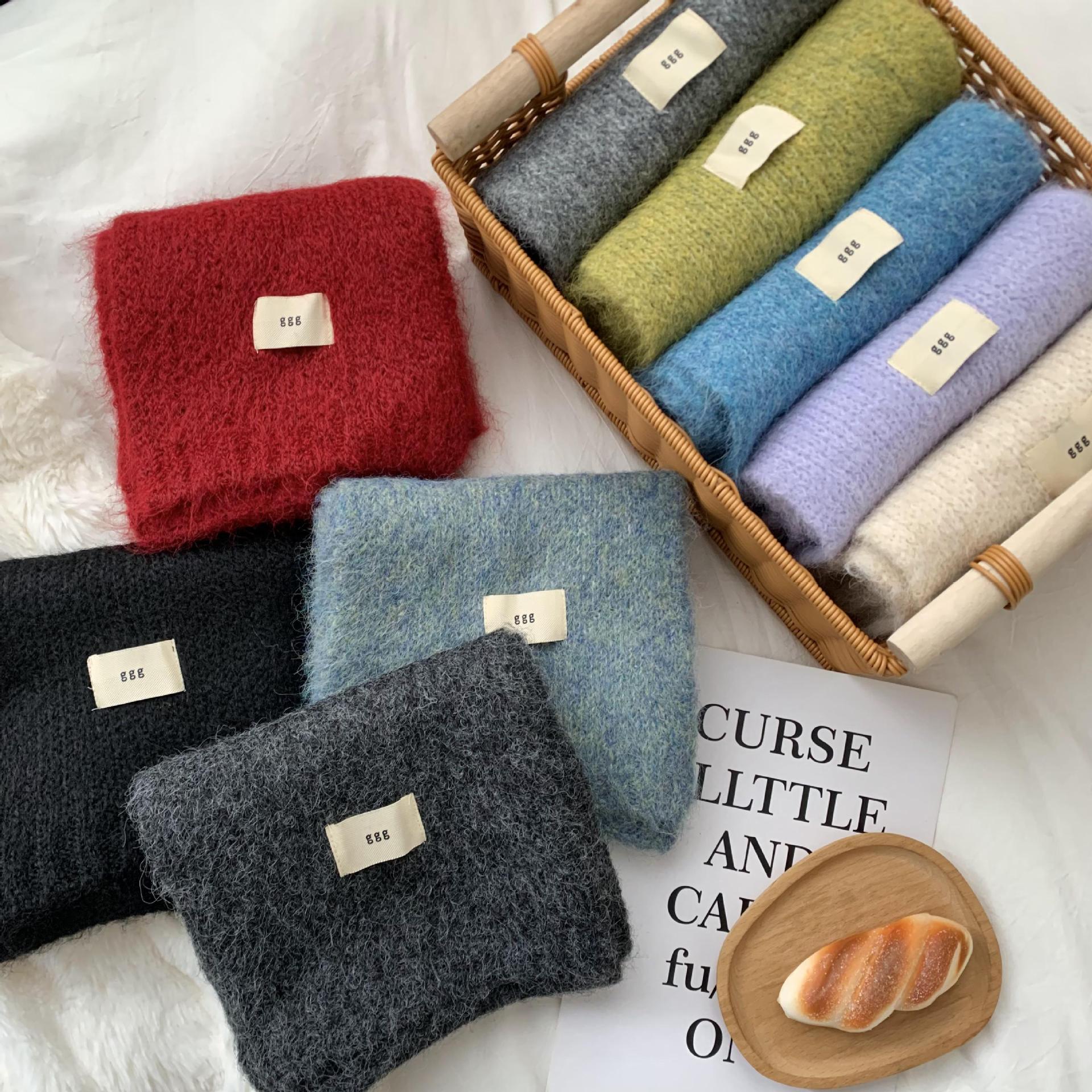 Bufandas de invierno femeninas de alta calidad 2025 nuevo color sólido calentamiento imitación de cachemira collar bufandas de punto al por mayor