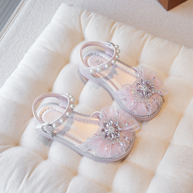 Niñas sandalias Baotou 2026 verano nuevo niño diamante arco princesa zapatos huecos moda versátil zapatos individuales image 3