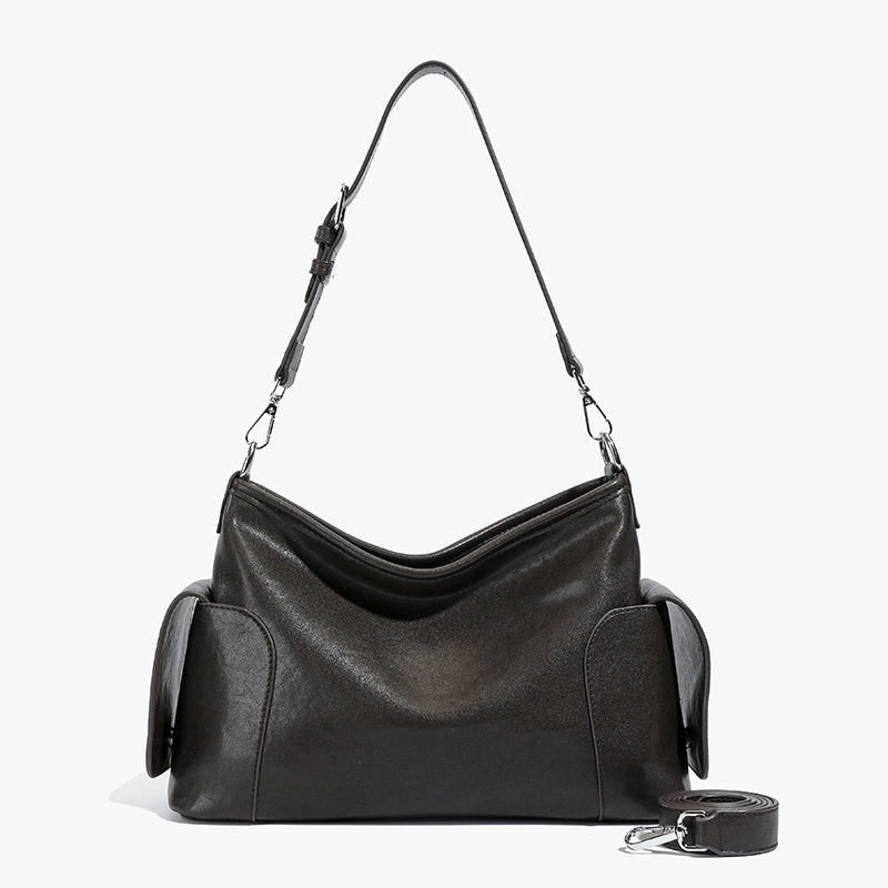 Bolsa de hombro y brazo de nicho francés para mujeres otoño / invierno 2025 nuevo retro mochila de cuero suave bolsa de viaje