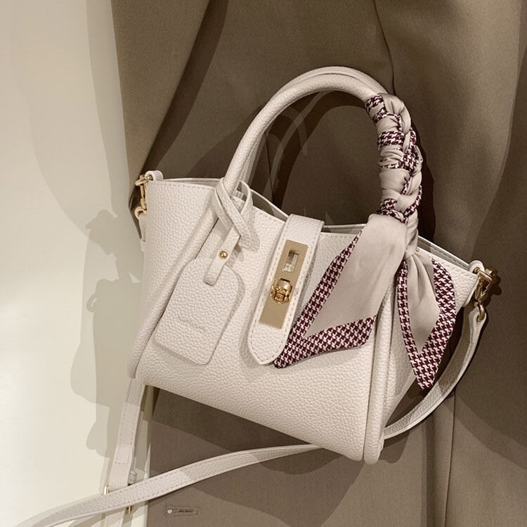 Niche High-End Wing-Shaped Bag, Trendy Genuine Leather Tote Bag, New Cowhide Togo Pattern Crossbody Small Bag Niche High-End Wing-Shaped Bag, Trendy Genuine Leather Tote Bag, New Cowhide Togo Pattern Crossbody Small Bag