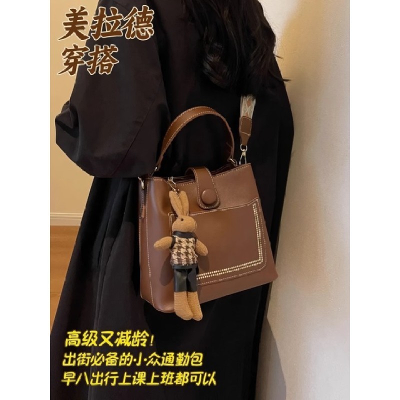 ワンショルダーの小さいカバンの女性2025春の新型の高級な質感のファッションのデザインの斜めのショルダーバッグのレトロな手提げバケツのカバン|undefined