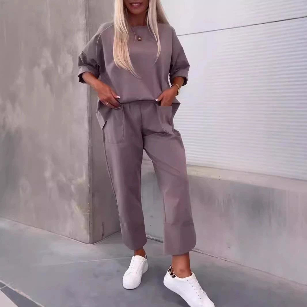 2024 Европейская и Американская трансграничная осенняя женская одежда Амазонка свободная повседневная двухсекционный комплект однотонных брюк с круглым вырезом
