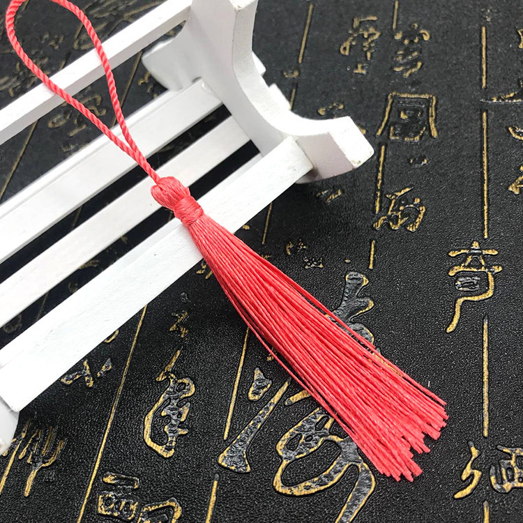 Fabricantes al por mayor de bordilla pequeña espiga colgante China nodo bordilla pequeño marcador de bordilla caja de regalo colgante fan espiga