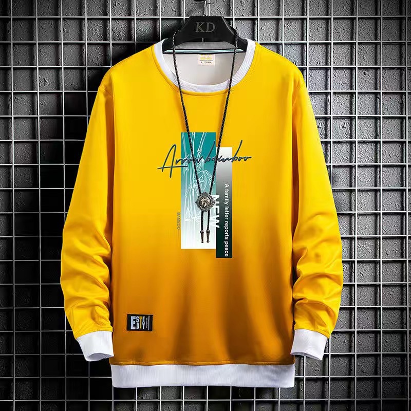 Camiseta de manga larga cuello redondo suéter moda marca 2023 nueva primavera y otoño camiseta juventud ropa superior