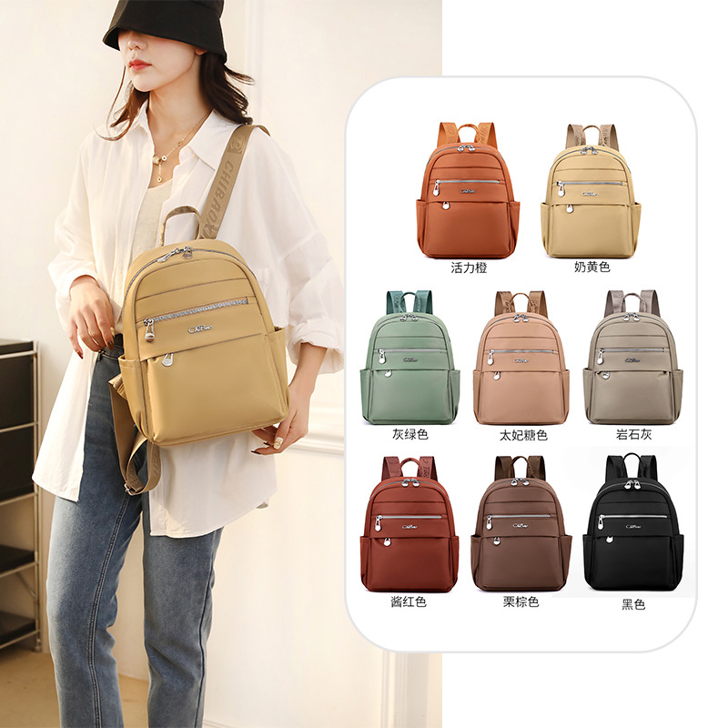 Mochila tendencia transfronteriza 2024 primavera nueva mochila para mujer bolsa de viaje informal mochila escolar para estudiantes bolsa de tela de nailon