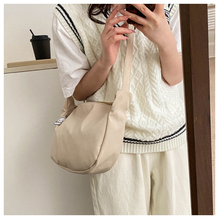 Large capacity canvas shoulder for women in spring summer 2023, new solid color, simple and fashionable casual bag,_voghion.com