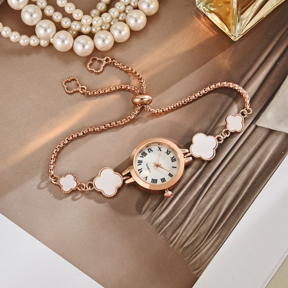 Reloj de estudiante transfronterizo Fritillaria ins estilo universitario temperamento esfera pequeña decoración de trébol de cuatro hojas pulsera perezosa