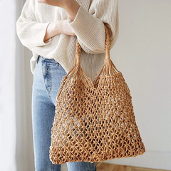 Handwoven Straw Tote Bag for Summer Beach Vacations — French-Style Beach Bag with Hollowed-Out, Bohemian Design