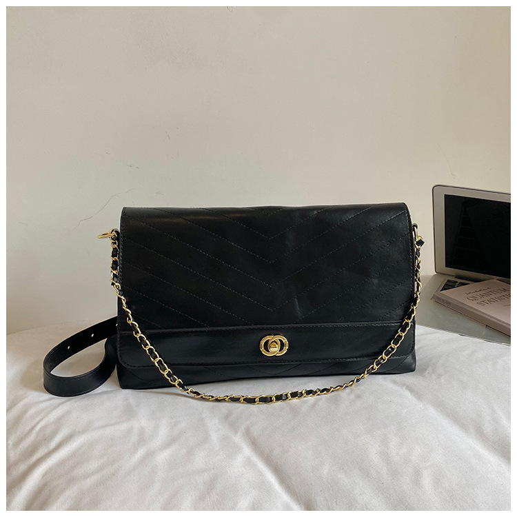 Xiaoxiang Lingfeng chain cross-border mochila bolso de hombro de moda europea y americana de viaje diario bolso de cerradura de comercio exterior
