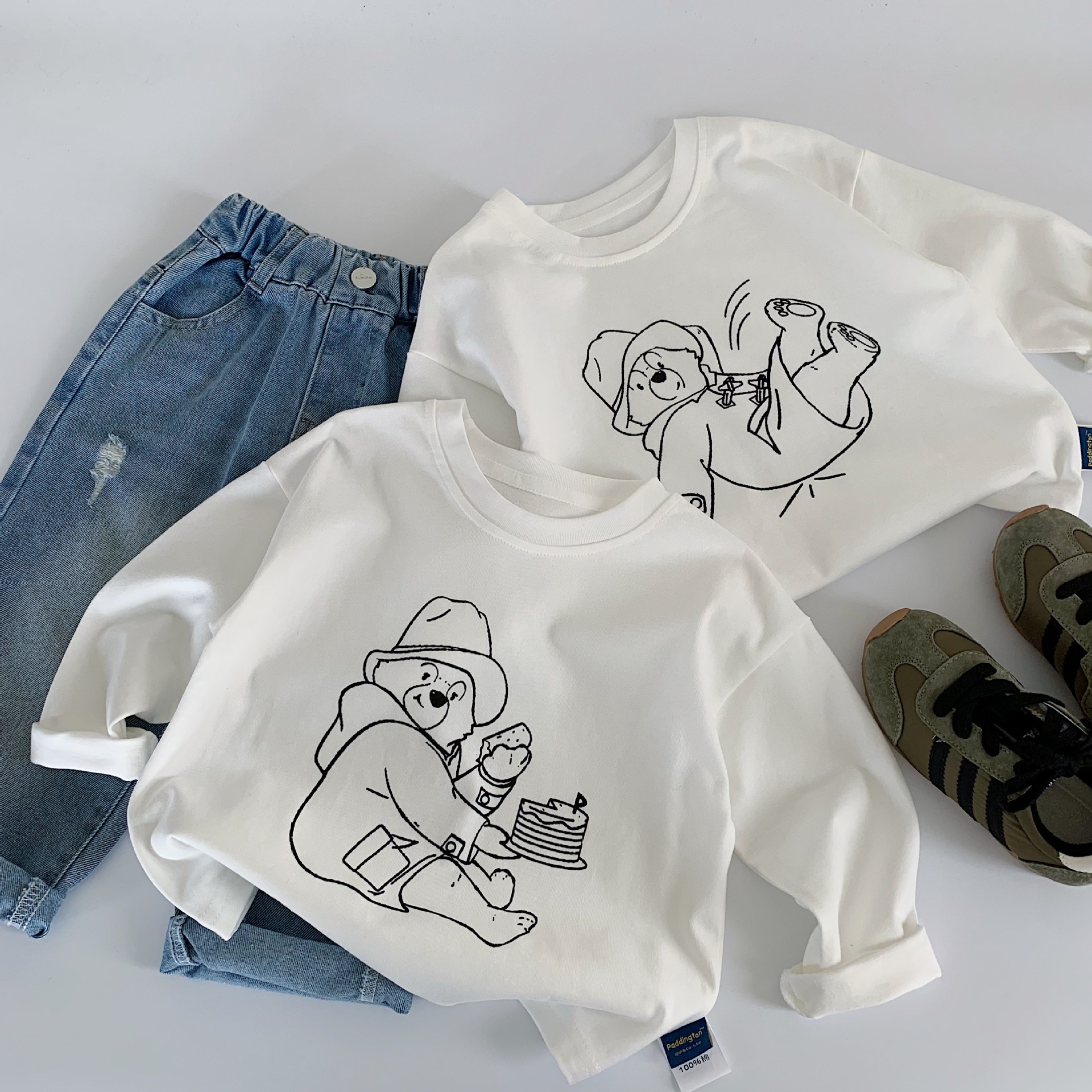 Mai Bao otoño camiseta infantil 2025 bebé caricatura Paddington oso blanco camiseta de base de tela ropa infantil de moda