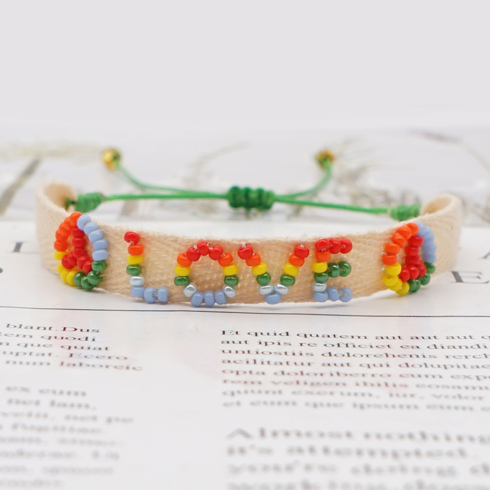 Bohemian Ribbon Rice Bead Woven Rainbow Letter Bracelet display picture 36