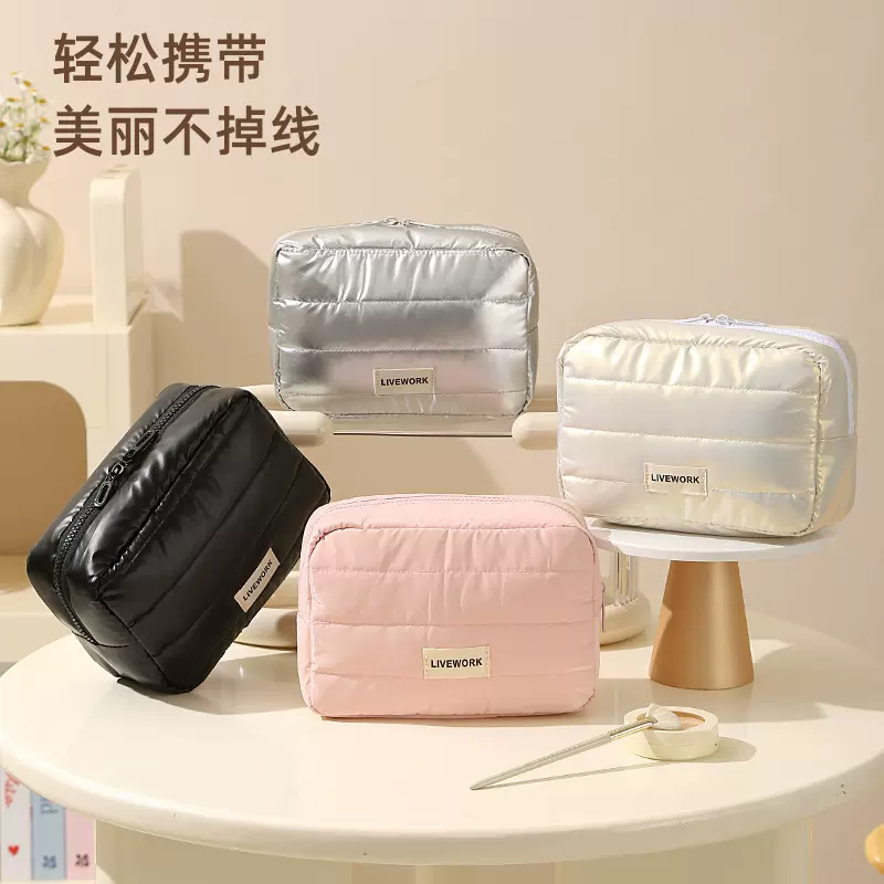 新款羽绒布收纳包复合棉高级感化妆包星辉大容量手提化妆品收纳包