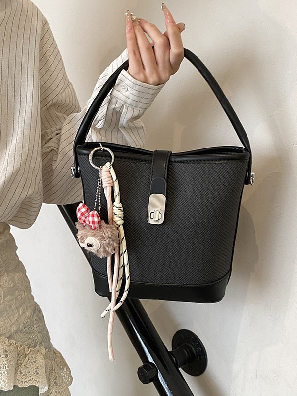 Comercio exterior transfronterizo retro bolso de cubo de mano de color 2025 nuevo nicho de alto nivel simple hombro bolso de mujer image 1