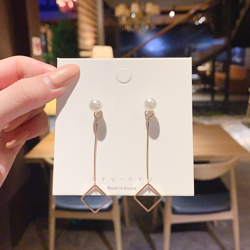 Pendientes de perlas, pendientes de estilo caliente, lujo ligero, pendientes simples de celebridades de Internet, accesorios de Yiwu, venta al por mayor