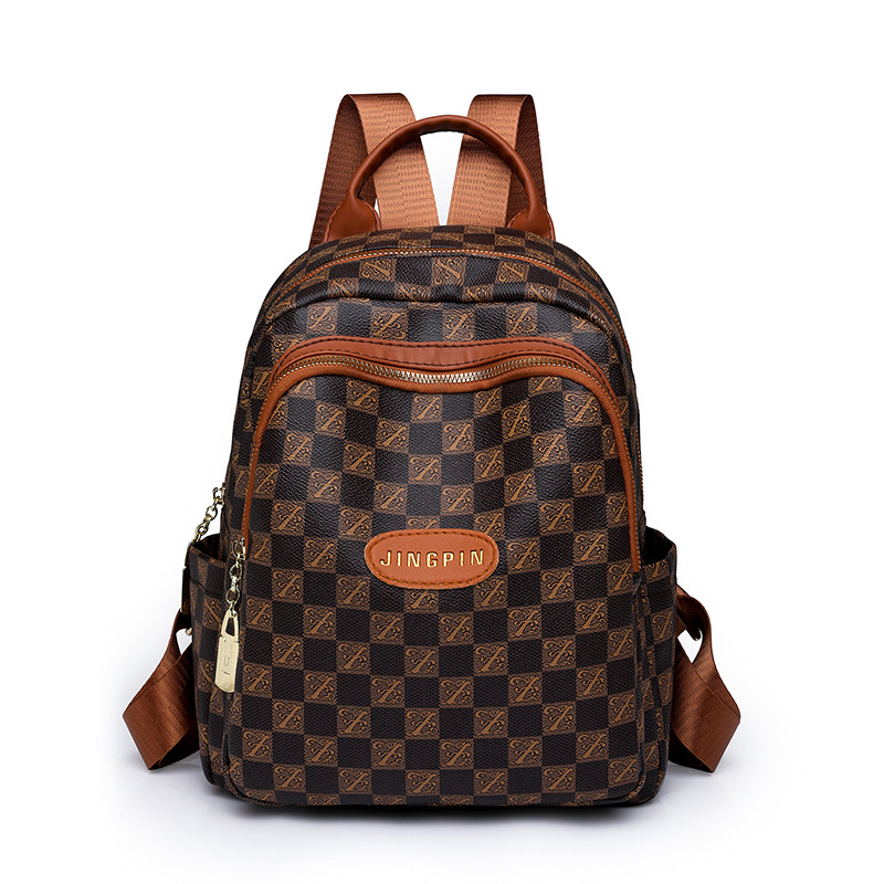 Spot al por mayor 2023 invierno nuevas señoras retro PU mochila de viaje de color de contraste de moda mochila escolar