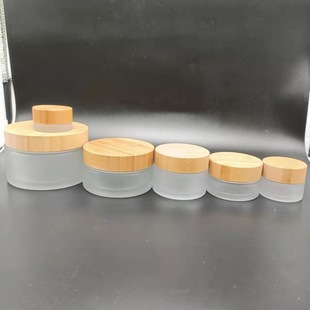 in stock wholesale 200g bamboo wood lid frosted glass jar bamboo wood lid cosmetic mask bottle glass cream bottle