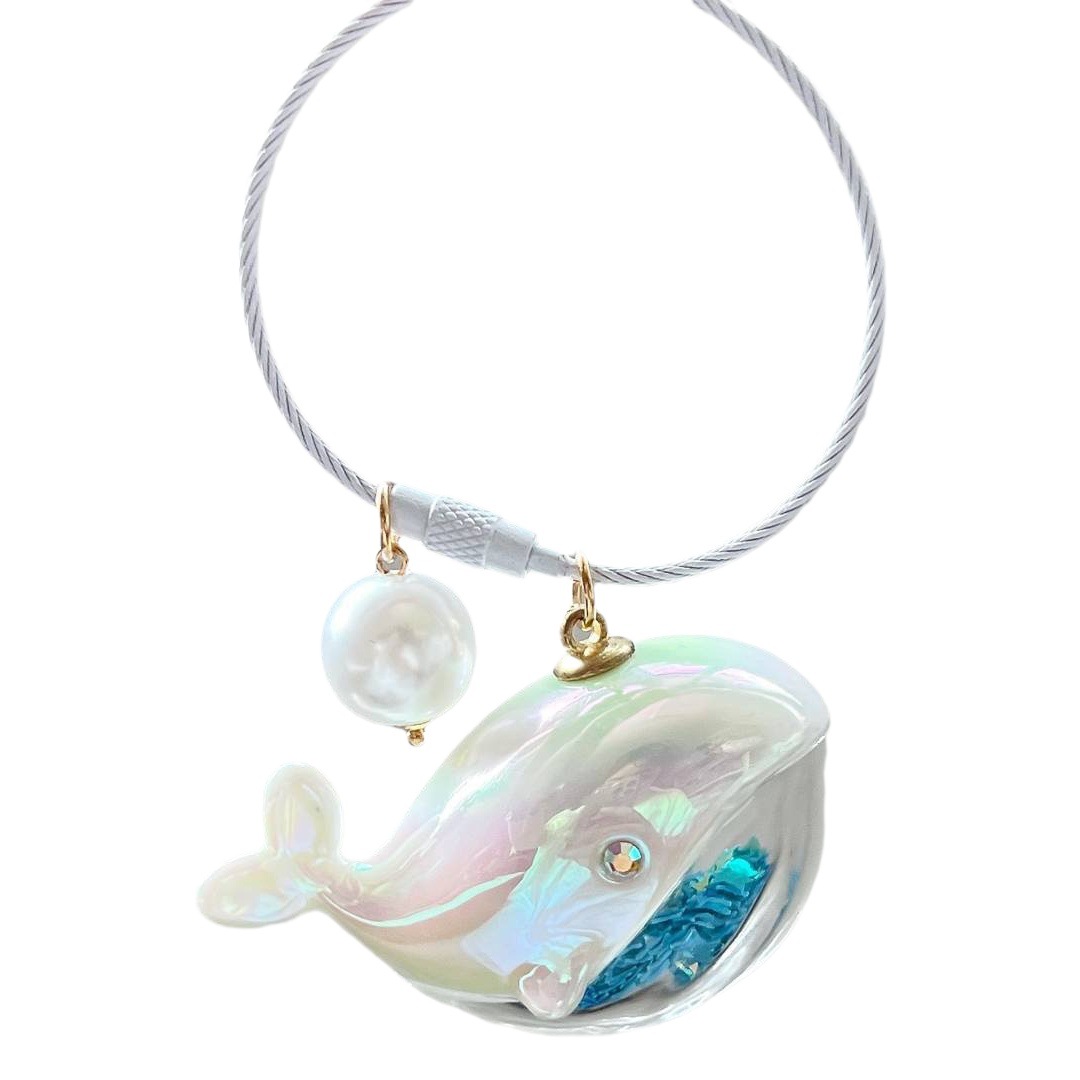 Xiaohongshu mismo estilo de cuerda de alambre de acero láser ballena llavero creativo regalo personalizado mochila colgante nicho de valor de alta apariencia