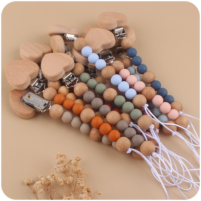 Nuevo bebé herramientas de haya melocotón corazón chupete clip Cadena de chupete cadena creativa bebé cuentas de silicona anti-gota cadena