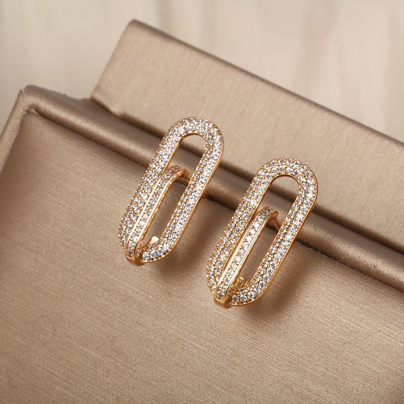 Xuping joyas geométricas elípticas micro incrustadas con orejetos de zircón, nicho de alto nivel, orejetos transfronterizos europeos y estadounidenses, orejetos para mujeres