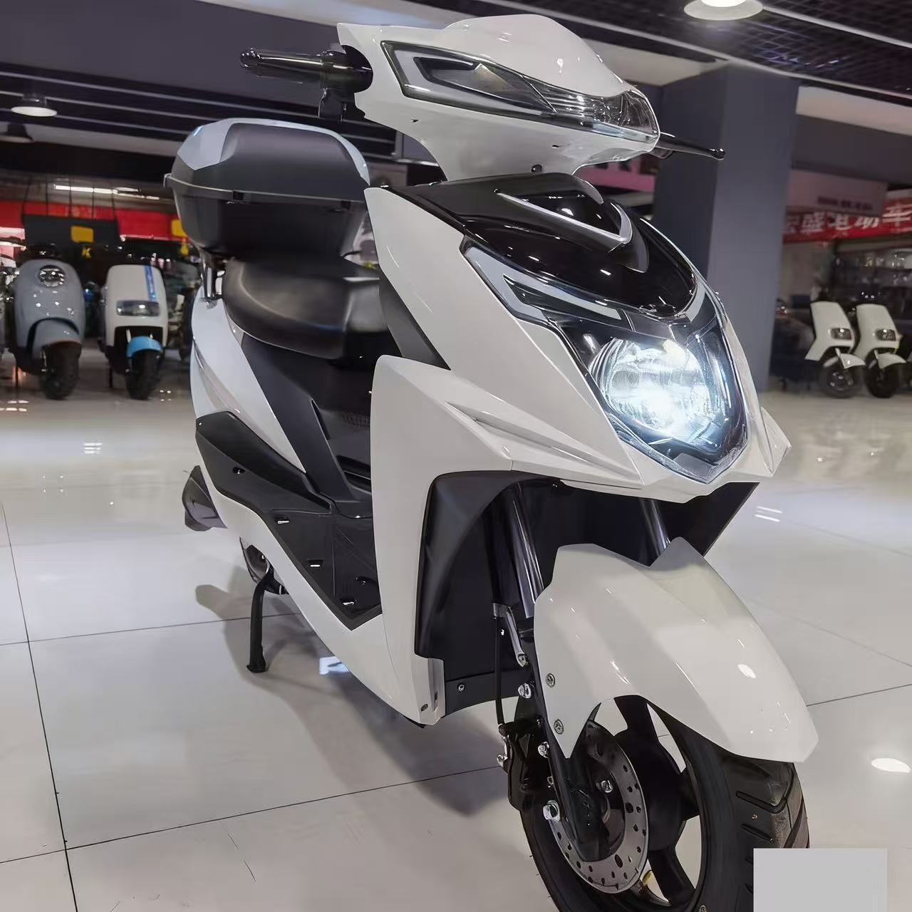 Dios de la guerra pedales fábrica de motocicleta eléctrica comercio exterior mayorista dos ruedas de alta potencia montaña motocicleta eléctrica para llevar coche de batería