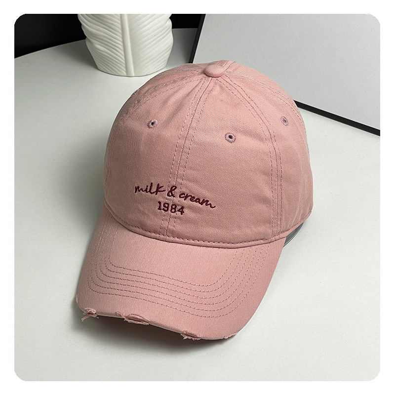 agujero nuevo sombrero de béisbol bordado de letras mujer simple cara pequeña gorra de lengua de goma ancha primavera y verano sombrero de pareja hombre