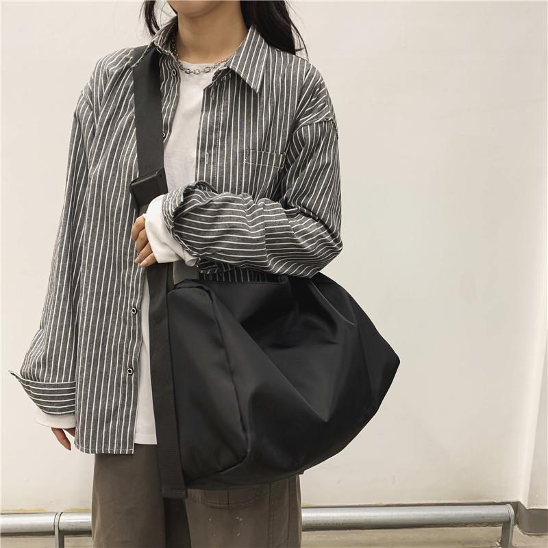 特大黒防水大型バッグ旅行バッグ学生クラスバックパック韓国語版軽量シンプルな純粋なカップル男性と女性のバッグ|undefined