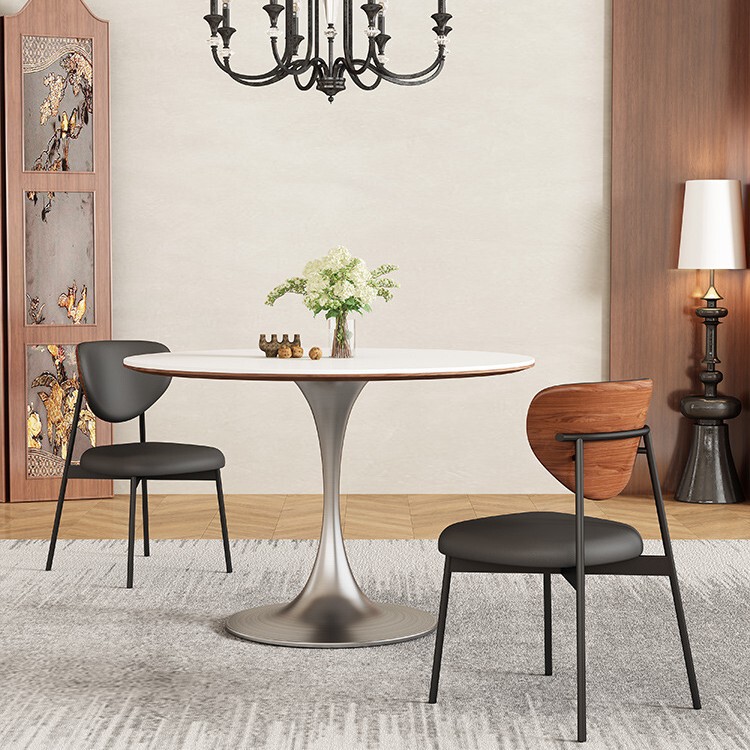 French-style, mid-century modern, slate-top round dining table for small homes, featuring a retro and minimalist design with stainless steel round table and chairs
