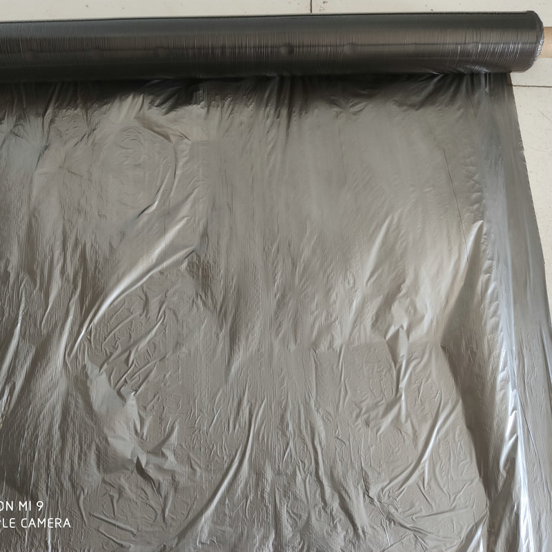 Película negra plateada personalizada del fabricante, película de acolchado de polietileno, plantación, deshierbe, anticongelante, película agrícola reflectante y a prueba de hierba de plástico