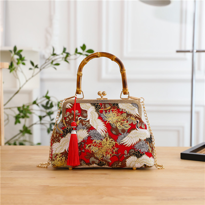 Bolso cruzado de un solo hombro estilo antiguo a juego bolso cheongsam bolso transfronterizo nuevo estilo retro estilo chino bolso portátil de oro de boca terminado