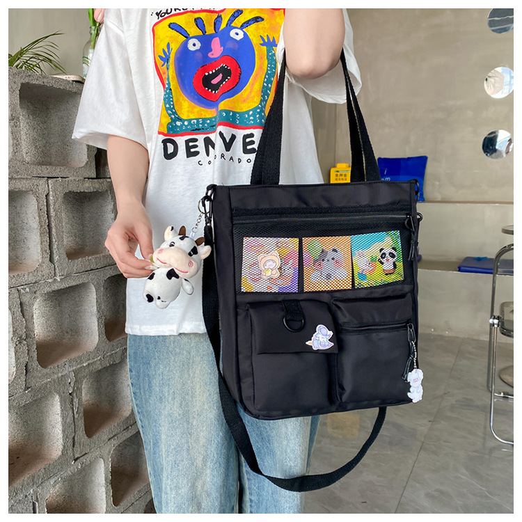 Large-capacity Japanese-style single-shoulder canvas bag for girls, versatile crossbody, ins, a tote bag for junior high school students' classes, and a schoolbag for after-school tutoring undefined