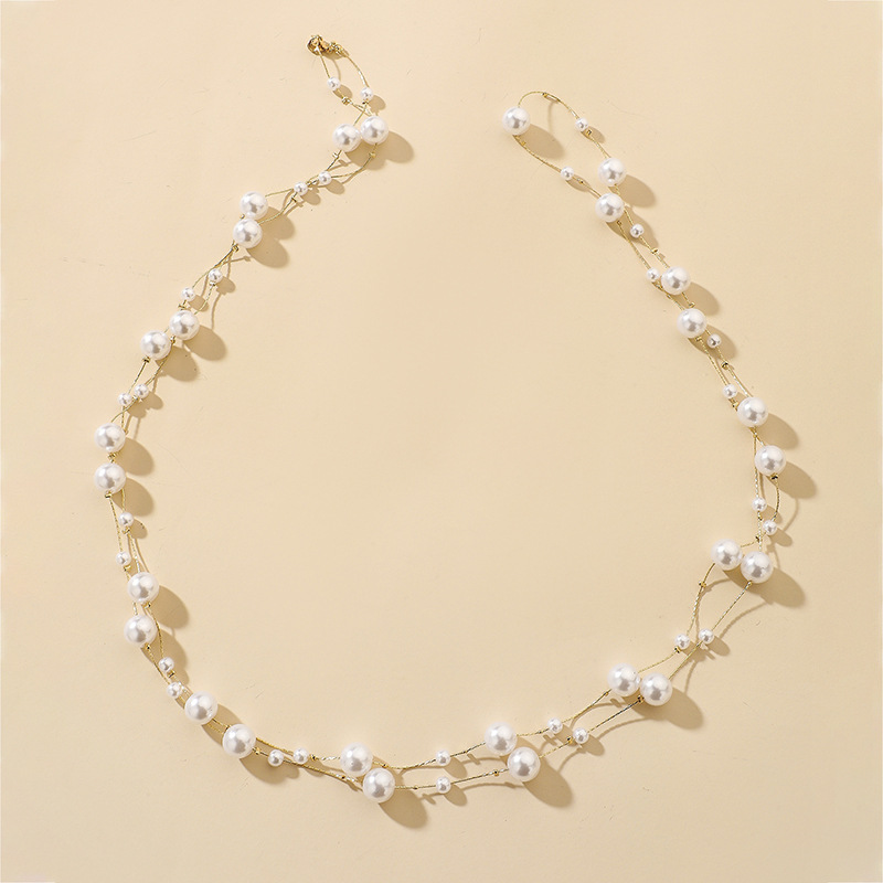 Exaggerated Long Pearl Simple Alloy Multi-layer Necklace Wholesale display picture 1