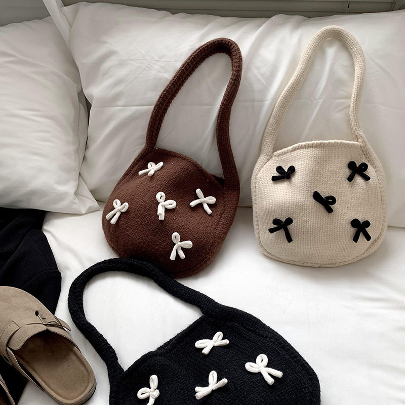 Bolsa de mano de mujer otoño / invierno nuevo estilo coreano atmósfera arco rojo tejido bolso de hombro lana