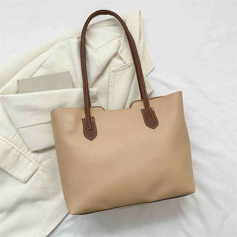 Estilo coreano versátil bolso texturizado de las mujeres 2023 otoño e invierno nuevo hombro axila bolsa popular bolsa de asas este año