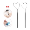 Heart-shaped examination mirror black