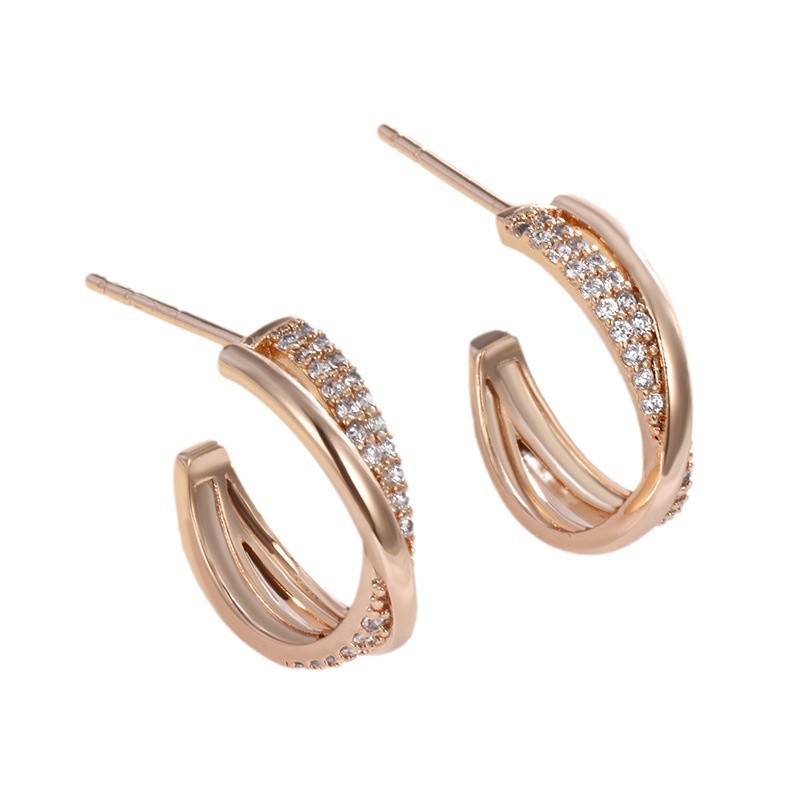Xuping temperamento medio arco hueco diamantes pernos cruzados de moda japonesa y coreana diseño dulce pendientes lujosos para mujeres