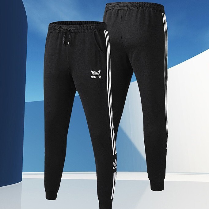 High-quality clover pattern fashion casual sports pants for men and women, suitable for spring and autumn, simple and versatile, slimming jogger pants