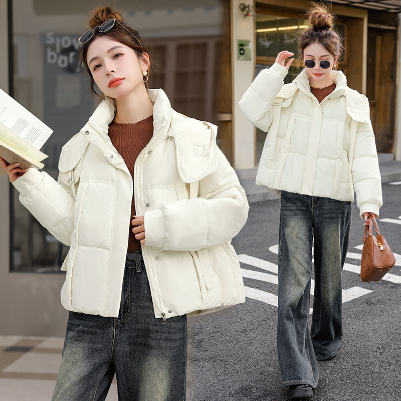 Corea del Sur Dongdamen ropa de algodón de pluma para mujeres corto 2025 invierno nuevo algodón delgado chaqueta con capuz transfronteriza