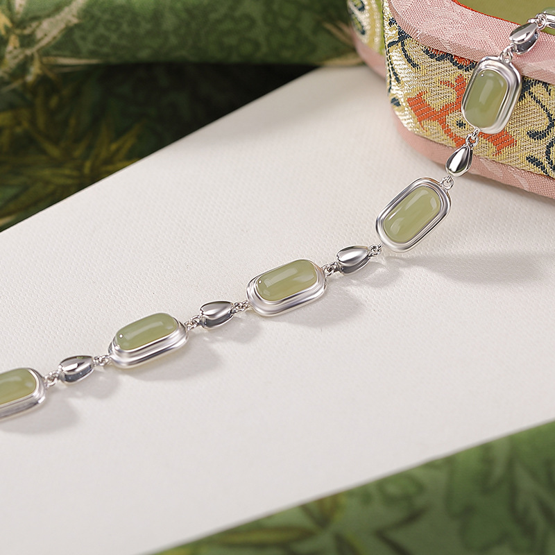 Vòng tay bạc S925 đính ngọc Hetian tự nhiên hình yên ngựa giọt nước phước lành — Một mảnh