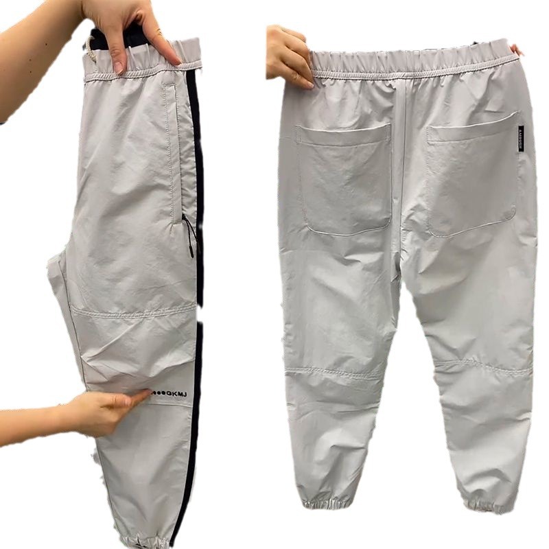 Trendy Marke Color Blocking Design Casual für Männer 2024 dünner Stil Harem modische vielseitige Neun-Punkt-Sporthose_voghion.com