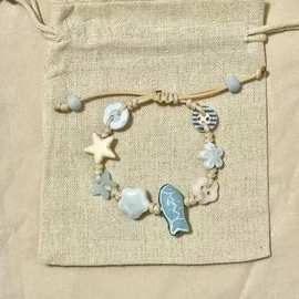 蓝色小鱼星星手链2024新款海洋生物设计感可爱少女高颜值纽扣手饰